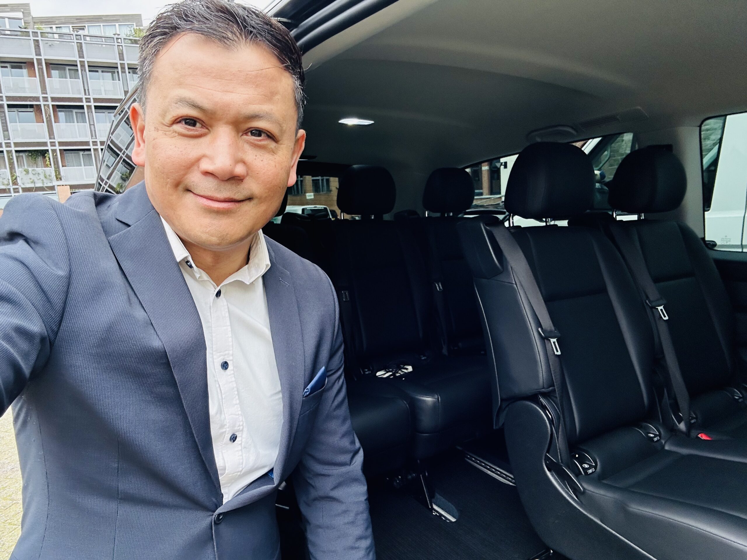 Ee thanongsak, a taxi driver, took a selfie to show the passenger seats inside his car.